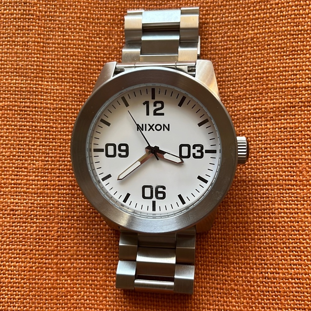 Never worn Nixon Corporal watch in stainless steel w white bezel. Oversized.